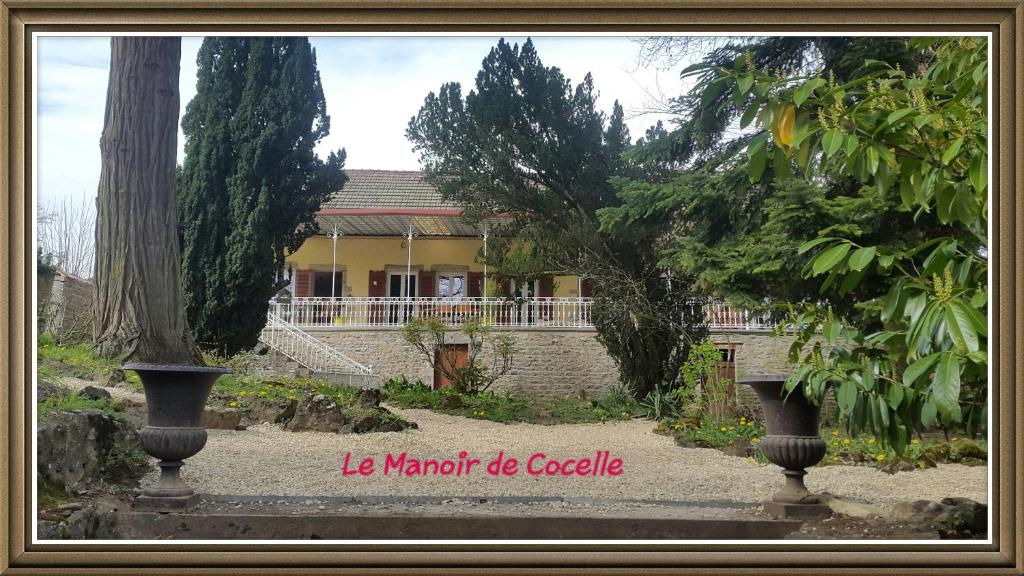 a picture of a house with the words la marilyn the castle at Le Manoir de Cocelle in Paris-lʼHôpital