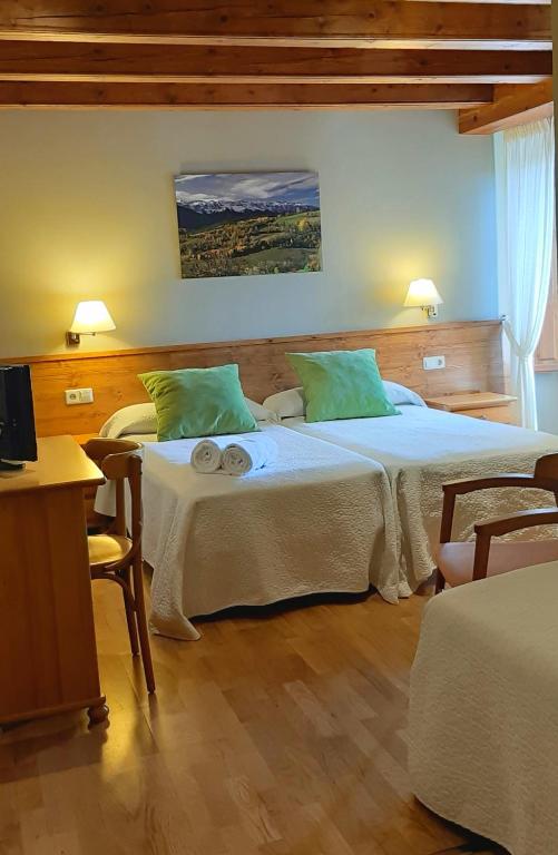 Postel nebo postele na pokoji v ubytování Cal Francès