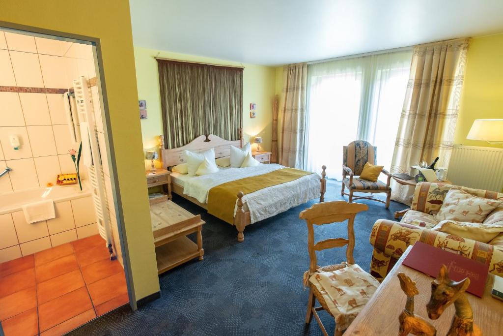 Postel nebo postele na pokoji v ubytování Hotel Lessing