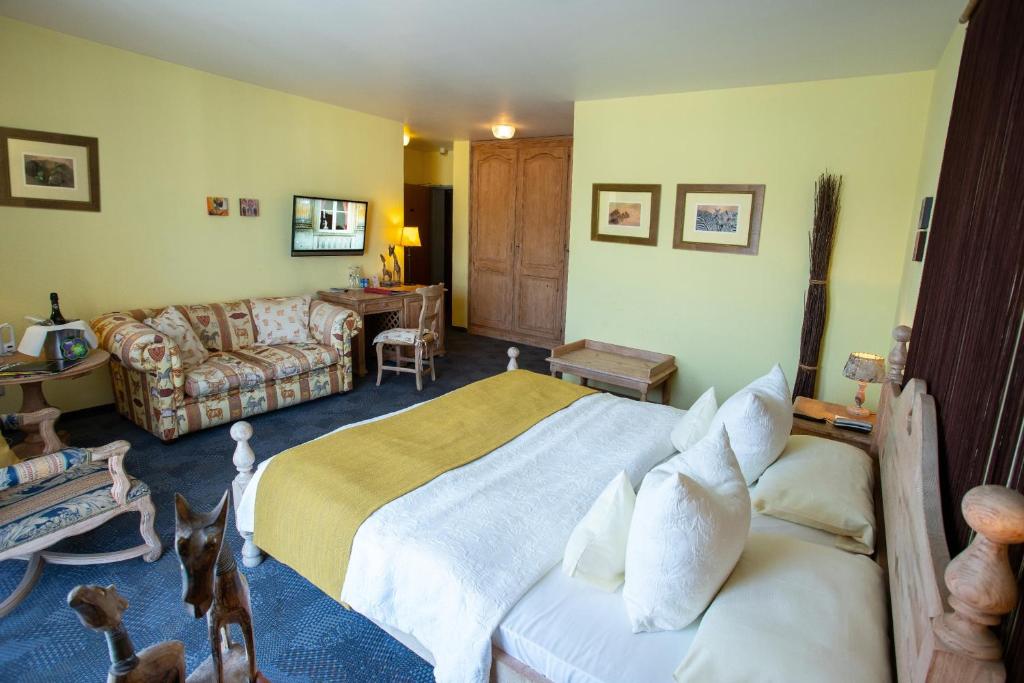Postel nebo postele na pokoji v ubytování Hotel Lessing