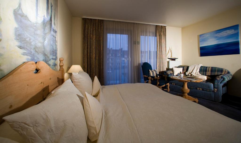 Postel nebo postele na pokoji v ubytování Hotel Lessing