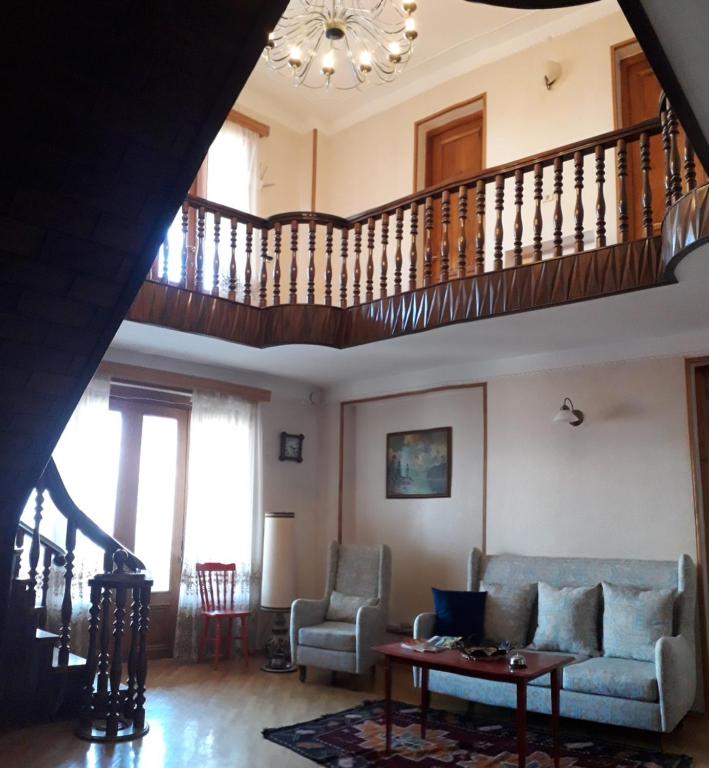 Posezení v ubytování Omsi House