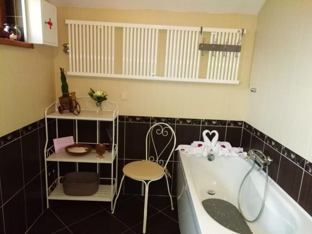 Koupelna v ubytování Apartment Satori