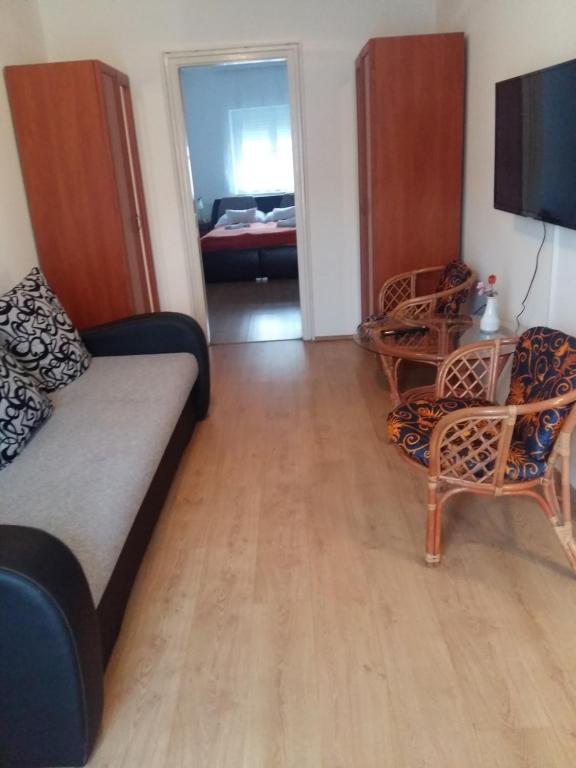 Postel nebo postele na pokoji v ubytování Retro Panzió