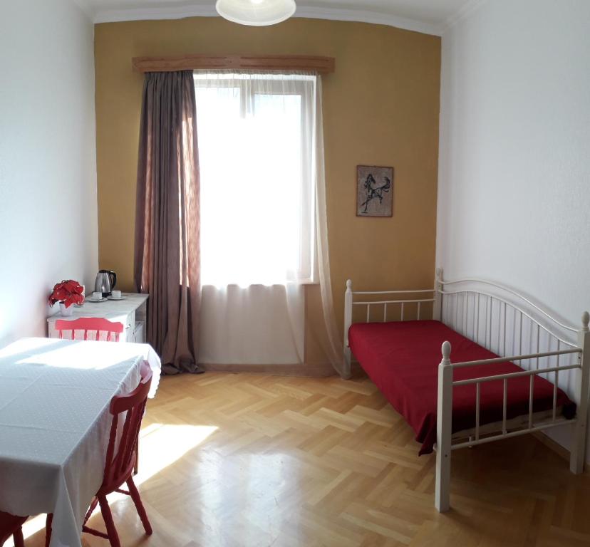 Postel nebo postele na pokoji v ubytování Omsi House
