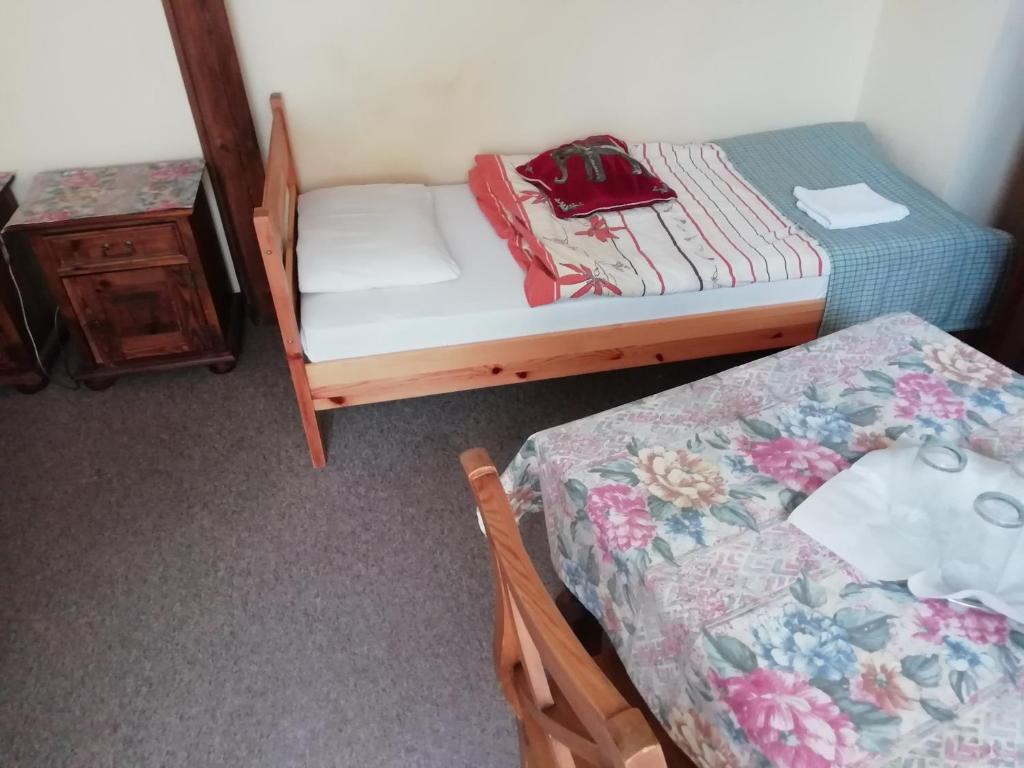 Posteľ alebo postele v izbe v ubytovaní Karczma na Woli