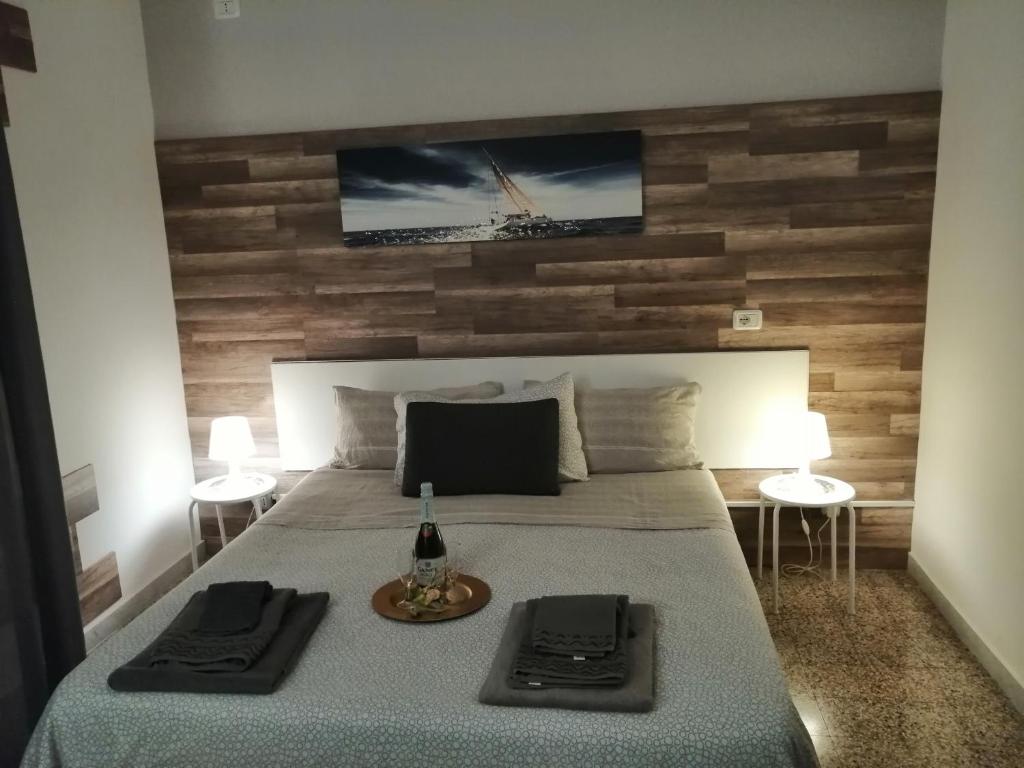 Rúm í herbergi á Kalefati Palace Loc.Turistica