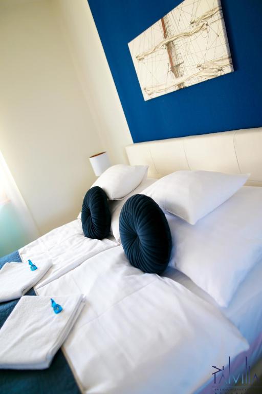 Postel nebo postele na pokoji v ubytování Pál Villa - Premium Apartments - Kecskemét