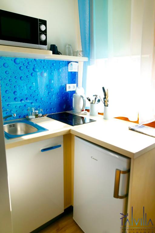 Kuchyň nebo kuchyňský kout v ubytování Pál Villa - Premium Apartments - Kecskemét