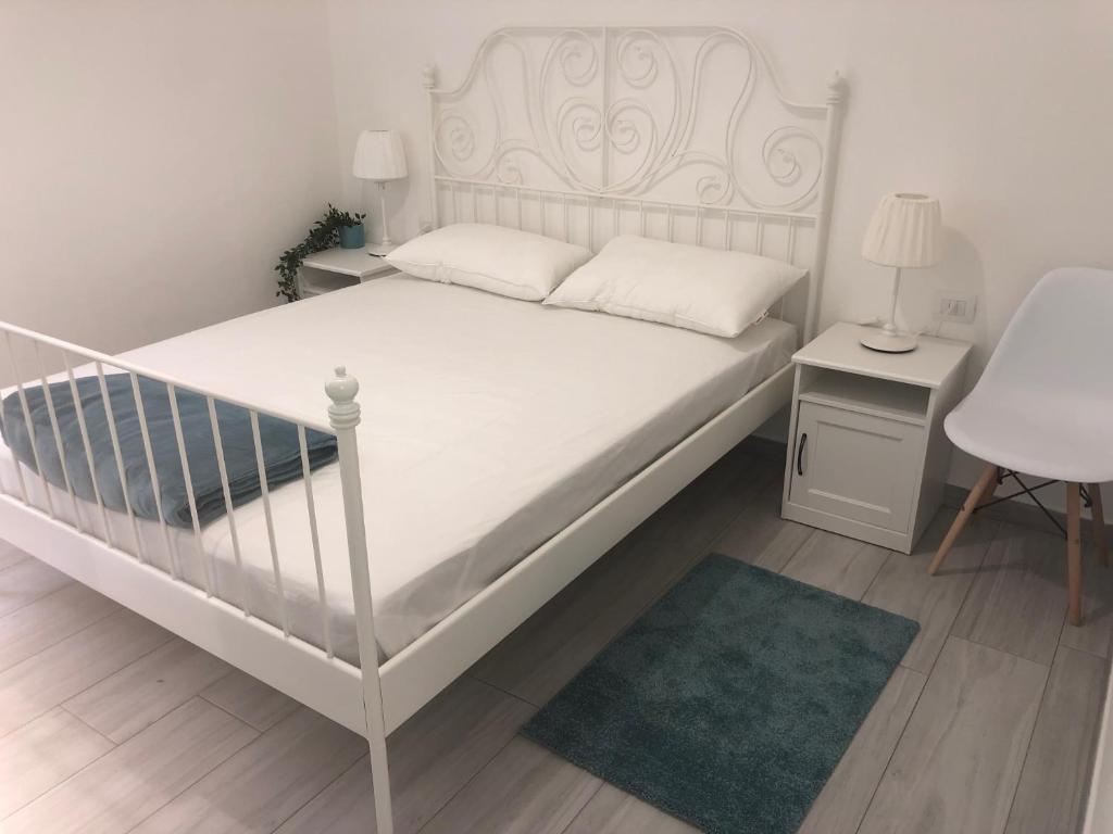 Postel nebo postele na pokoji v ubytování Le Tre Borghesi