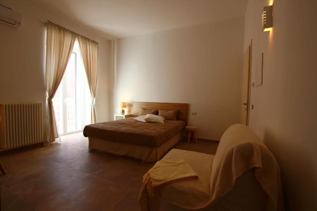 Posteľ alebo postele v izbe v ubytovaní San Michele Luxury Rooms
