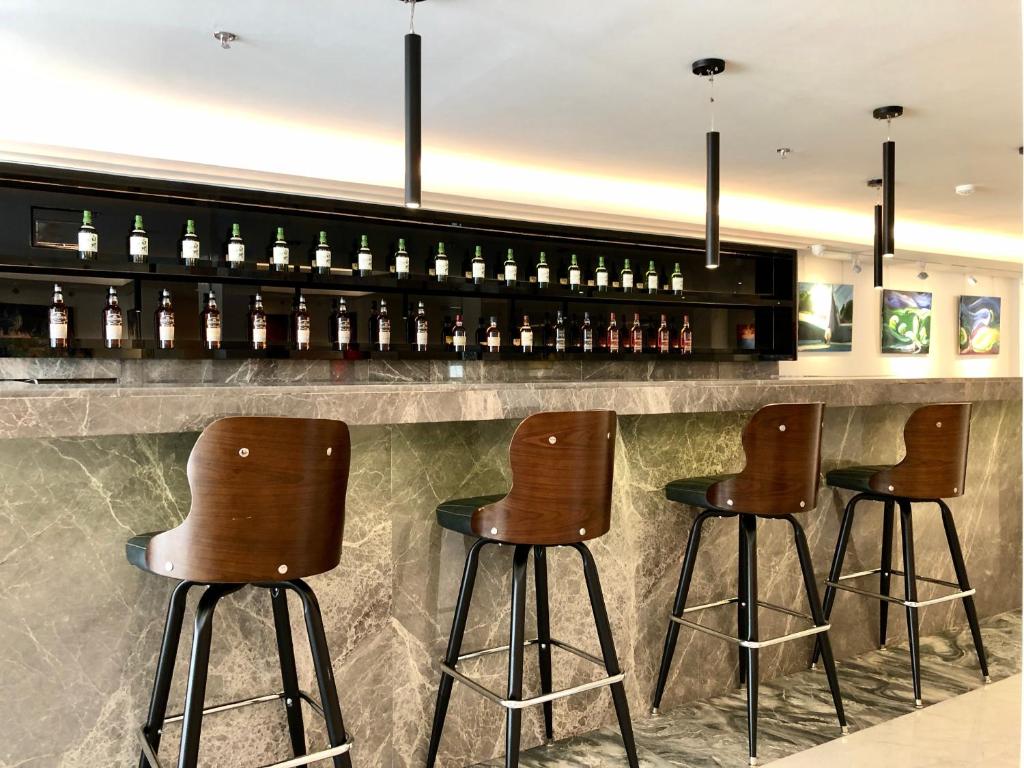 Salone o bar di K.C Hotel