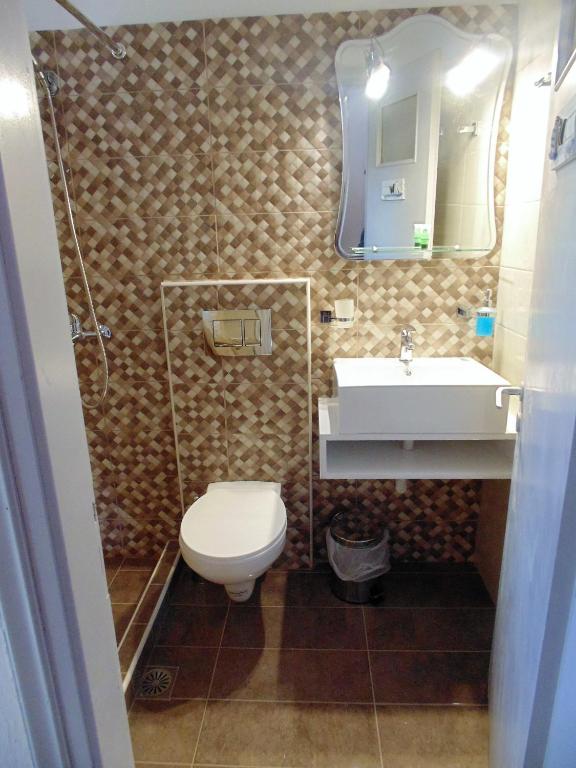 Koupelna v ubytování Froudi Rooms