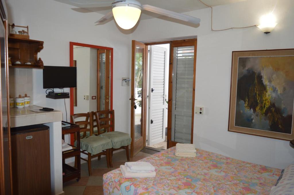 Postel nebo postele na pokoji v ubytování B&B Il Giardino Segreto