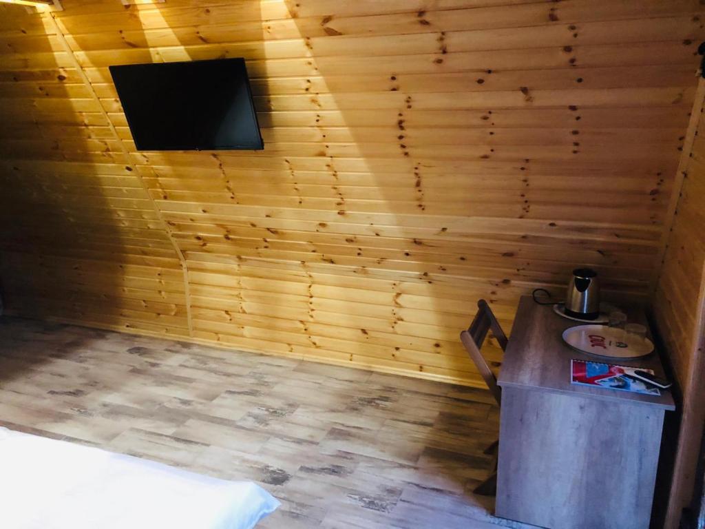 TV a/nebo společenská místnost v ubytování Pastravaria Zavoi
