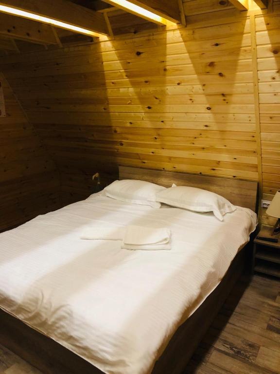 Postel nebo postele na pokoji v ubytování Pastravaria Zavoi