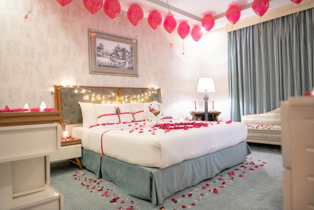 Postel nebo postele na pokoji v ubytování Viola Hotel