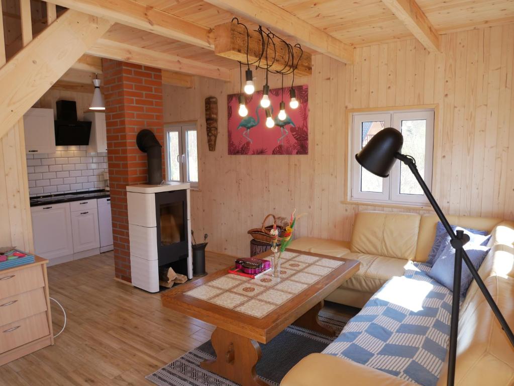 Kuchyň nebo kuchyňský kout v ubytování Domki Karaibskie