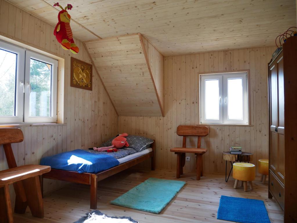 Postel nebo postele na pokoji v ubytování Domki Karaibskie