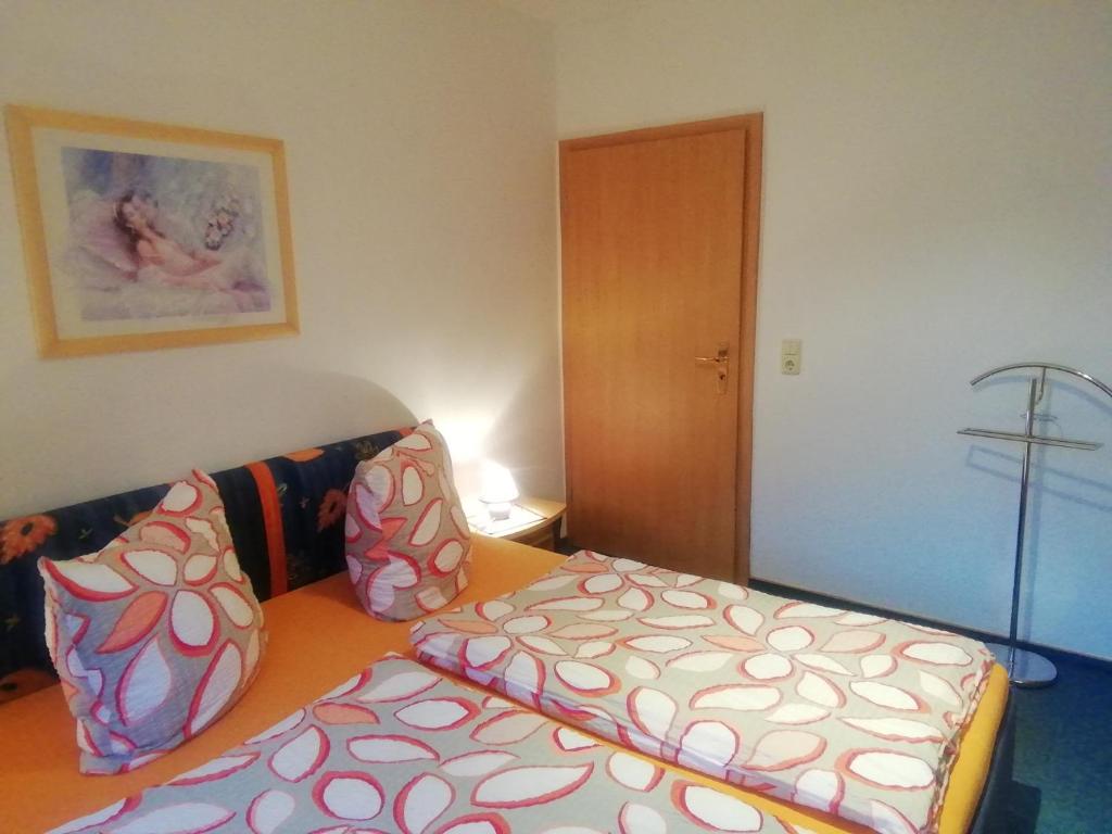 Postel nebo postele na pokoji v ubytování Apartments Achterblick