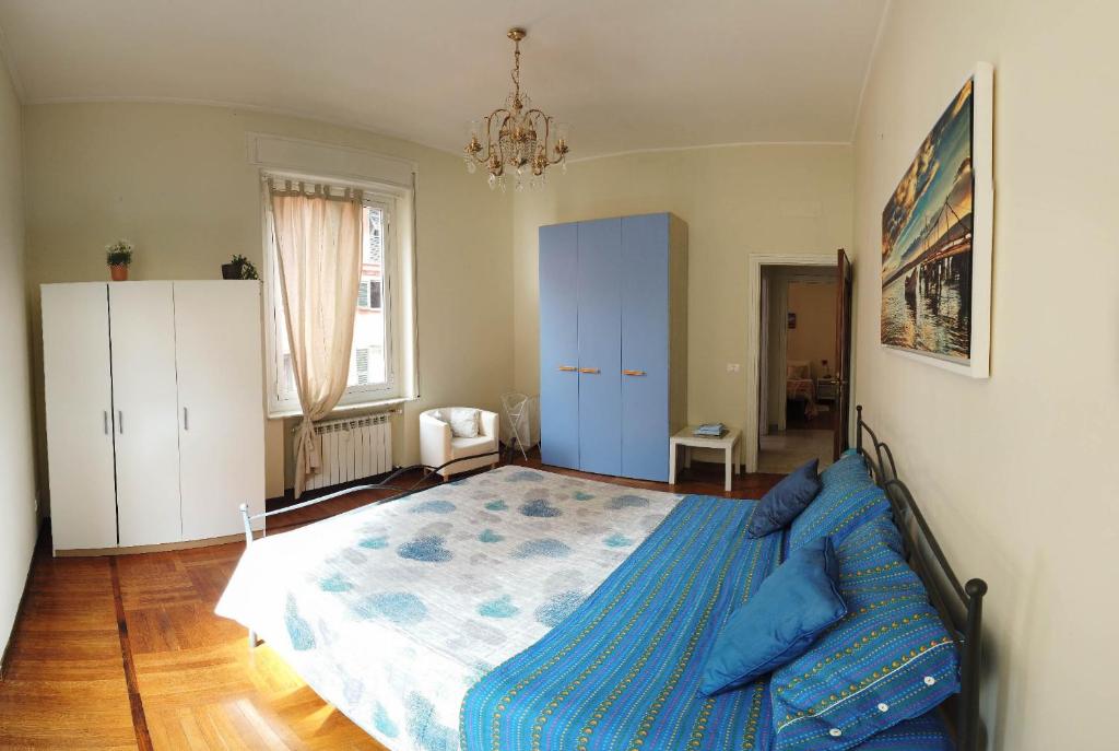 A bed or beds in a room at Assarotti Centre Apartment