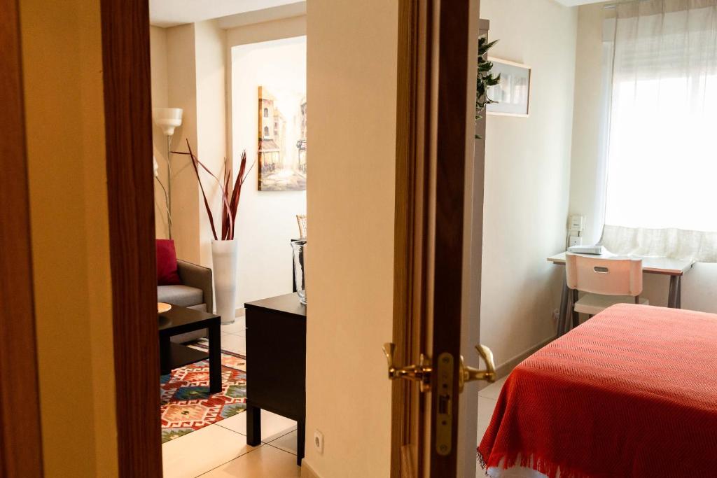 Postel nebo postele na pokoji v ubytování Apartamentos Duque