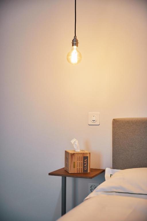 Postel nebo postele na pokoji v ubytování Italian Lifestyle Hotel & Osteria Chartreuse