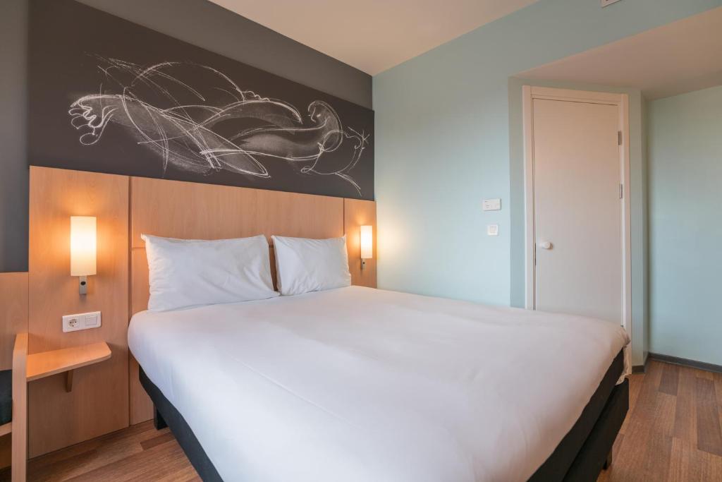 Postel nebo postele na pokoji v ubytování Ibis Setif