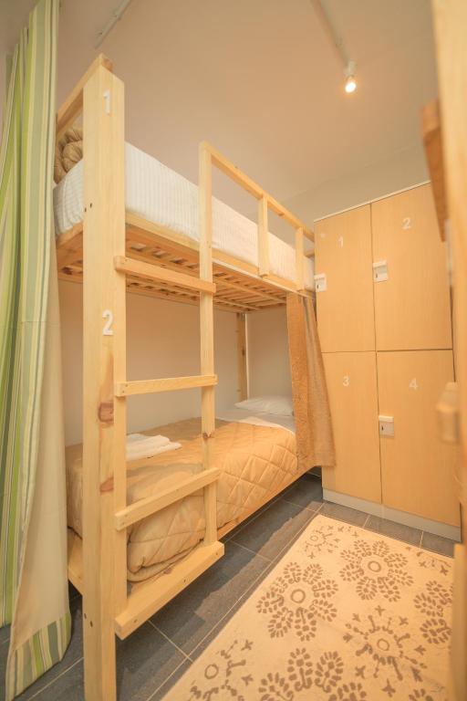 Letto o letti in una camera di Mosaic Home