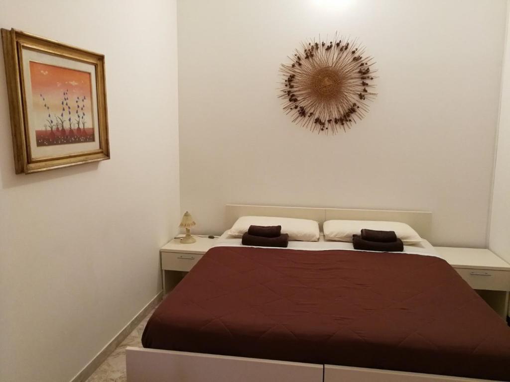 Postel nebo postele na pokoji v ubytování La Ozza B&B