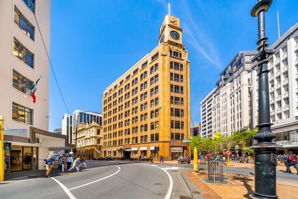 a tall building with a clock tower on top of it at Studio 5E in Wellington