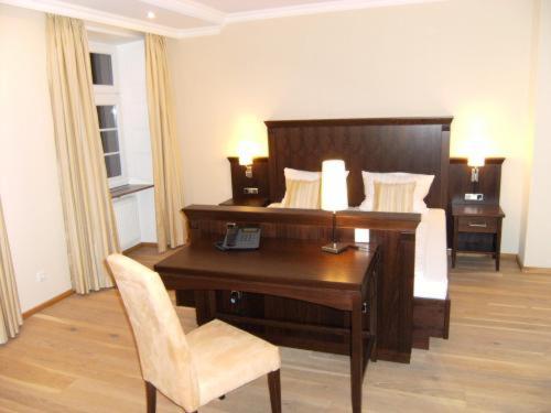 Postel nebo postele na pokoji v ubytování Hotel Restaurant Ölmühle