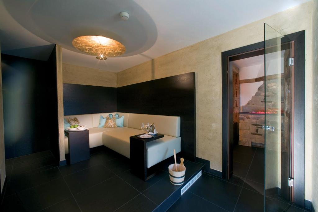 Postel nebo postele na pokoji v ubytování Wellnessresidenz Schalber