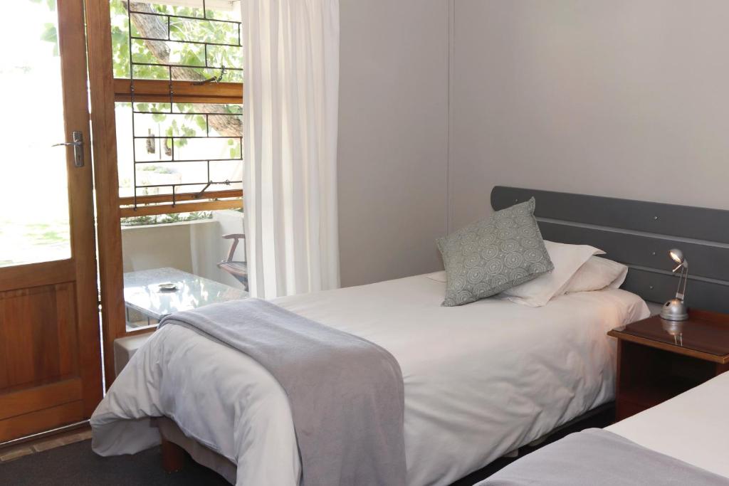 The Village Guesthouse - Single Room With Garden View