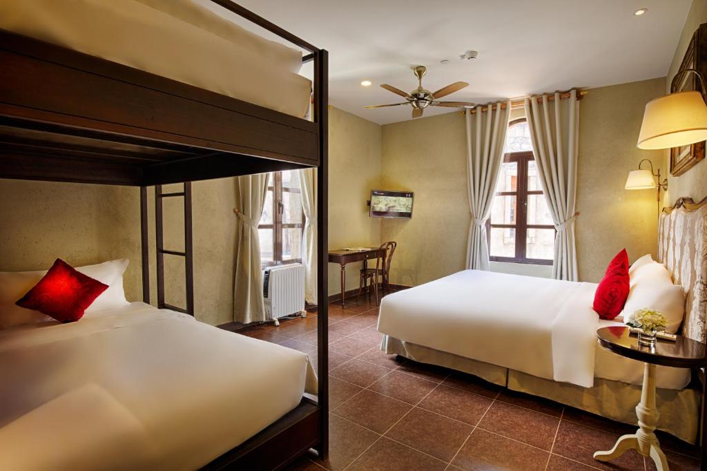 Family Deluxe Room with One King Bed and One Single Bed