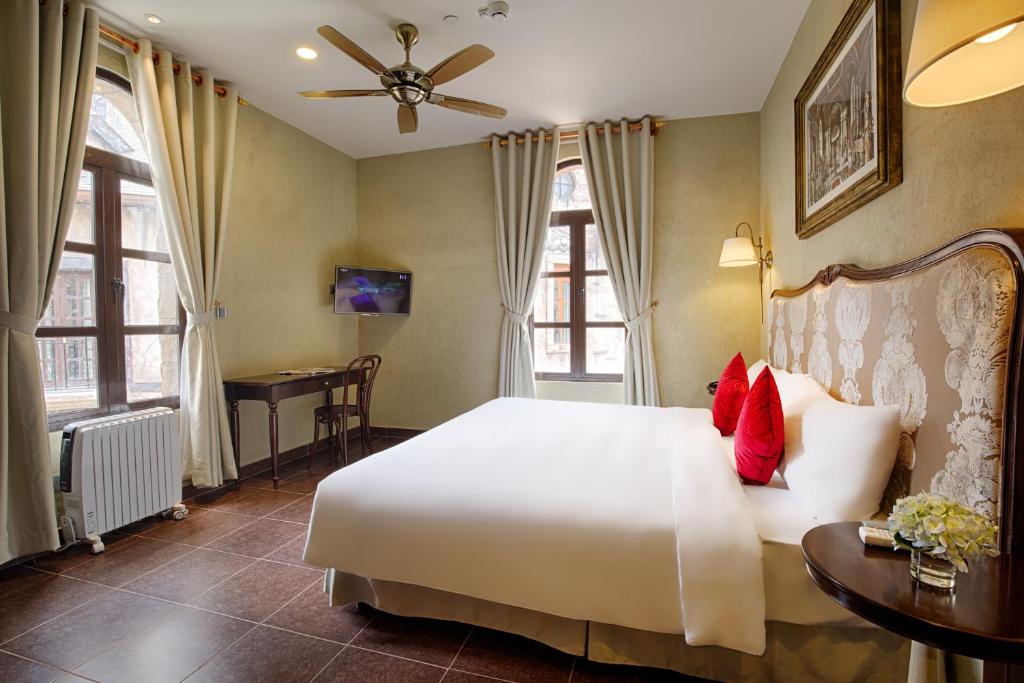 Family Deluxe Room with One King Bed and One Single Bed