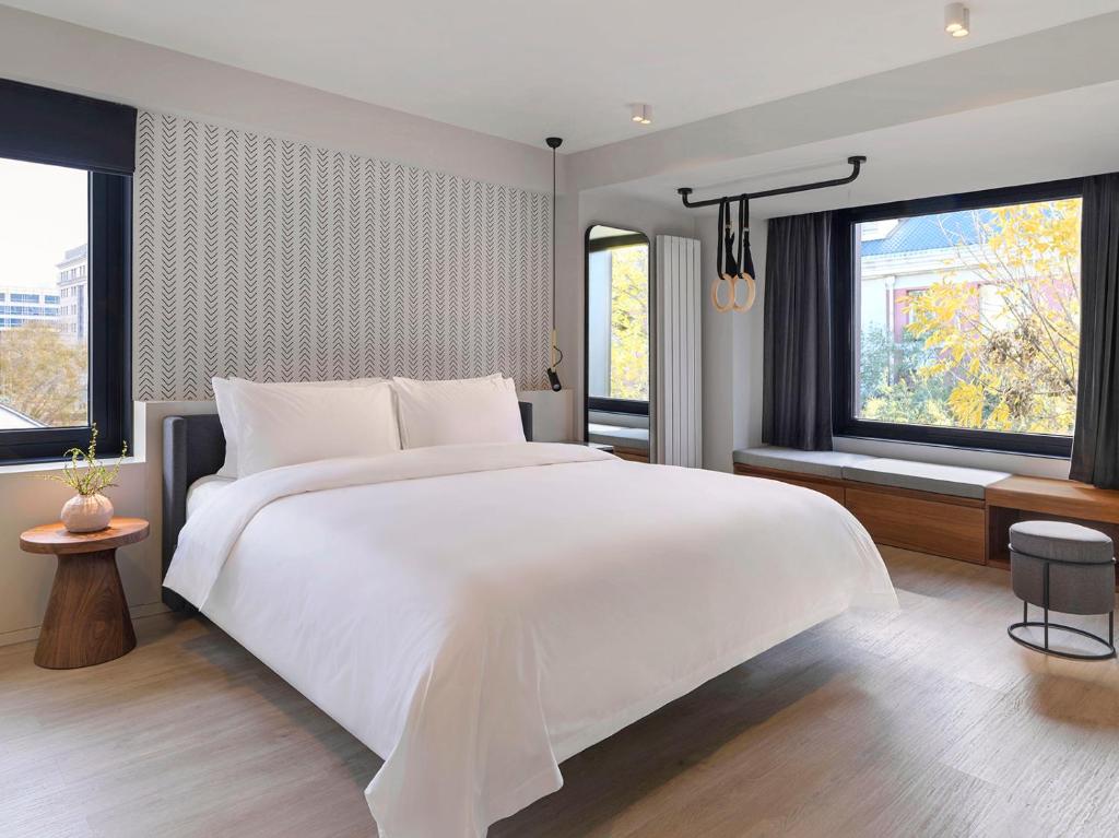 Postel nebo postele na pokoji v ubytování Stey Beijing Wangfujing Hotel