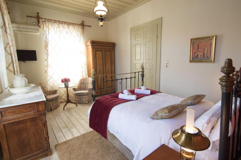 Posteľ alebo postele v izbe v ubytovaní Ganimede Hotel, Galaxidi