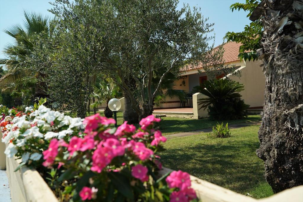Zahrada ubytování Villaggio Le Palatine