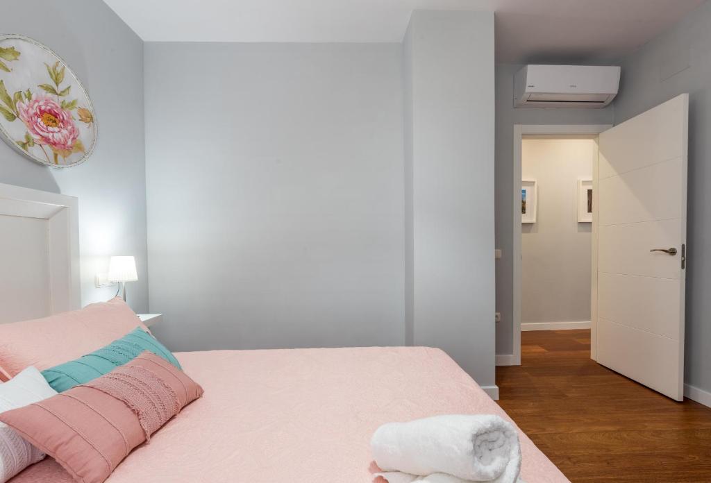 Posteľ alebo postele v izbe v ubytovaní Premium Mediterraneo Beach, Malaga Apartamento junto a la playa