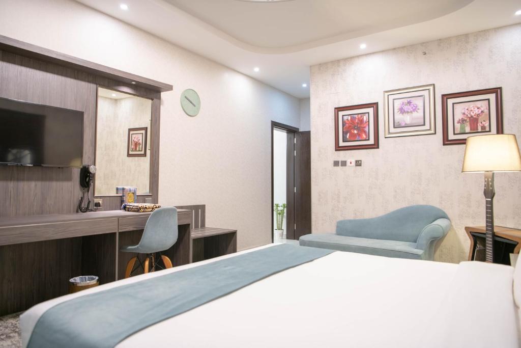 Postel nebo postele na pokoji v ubytování Viola Hotel