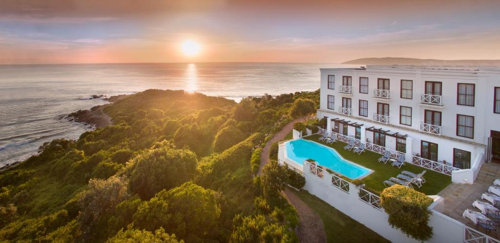 an aerial view of a hotel and the ocean at The Plettenberg Hotel in Plettenberg Bay