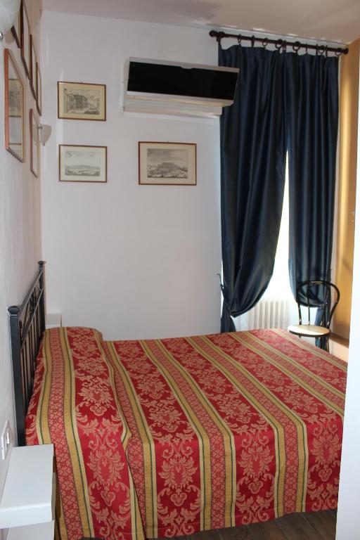 Postel nebo postele na pokoji v ubytování Hotel San Lorenzo