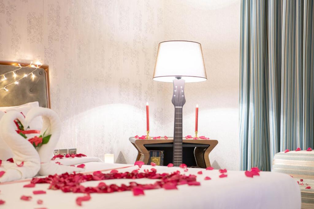 Postel nebo postele na pokoji v ubytování Viola Hotel