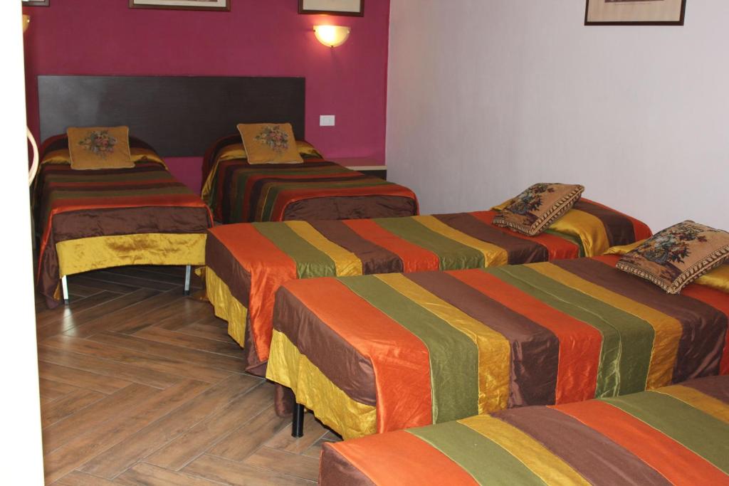 Postel nebo postele na pokoji v ubytování Hotel San Lorenzo