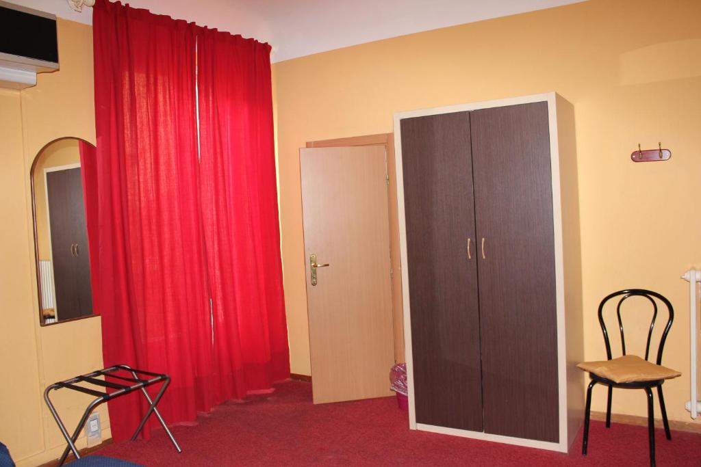 TV a/nebo společenská místnost v ubytování Hotel San Lorenzo