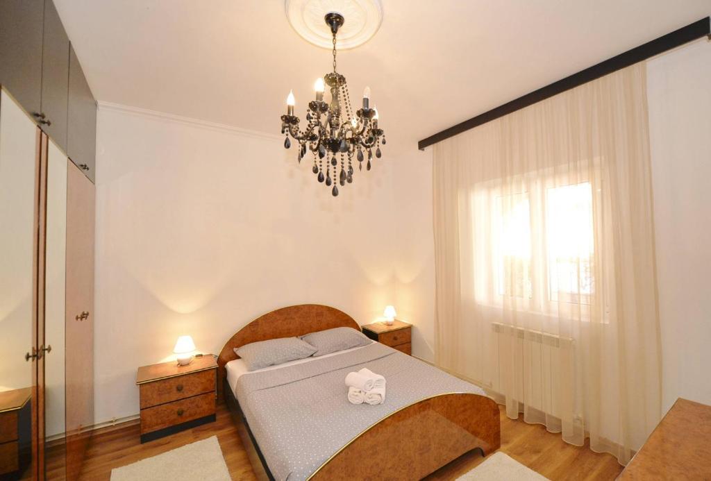 Postel nebo postele na pokoji v ubytování Sunshine of Montenegro - Family Oasis