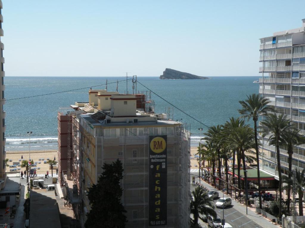 a view of the beach from a building at Ducado - Fincas Arena in Benidorm