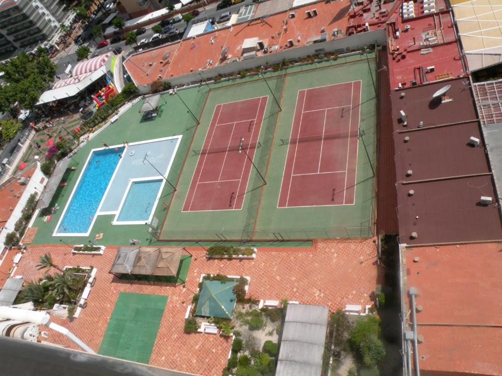 an aerial view of a building with solar panels on it at Gemelos 2 II - Fincas Arena in Benidorm