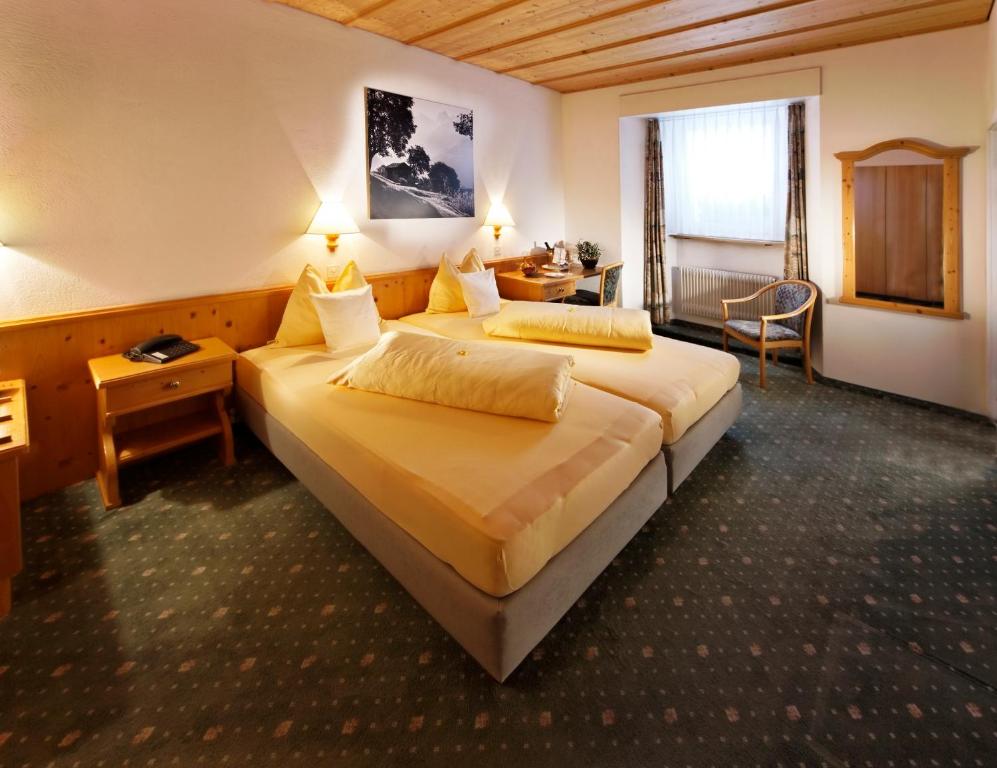 Postel nebo postele na pokoji v ubytování Hôtel Bodenhaus